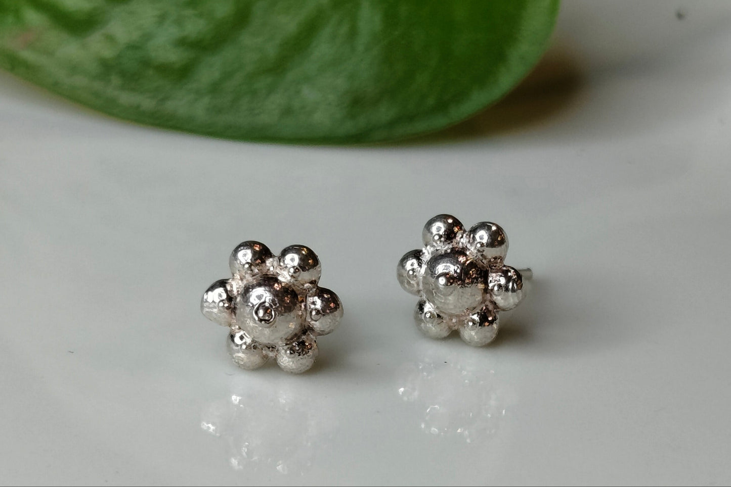 Tiny flower stud