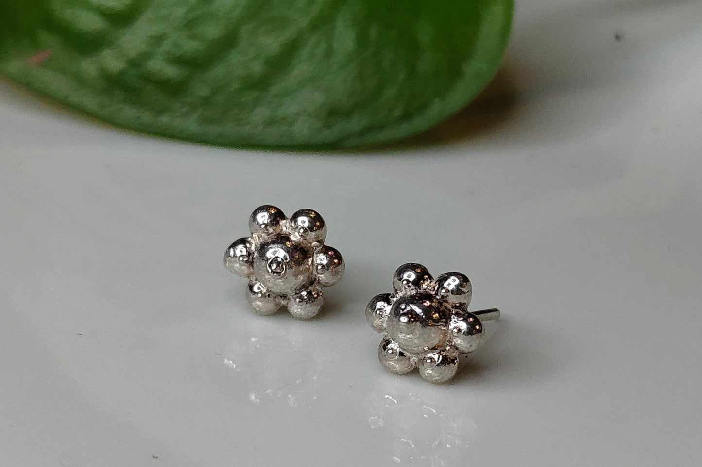 Tiny flower stud