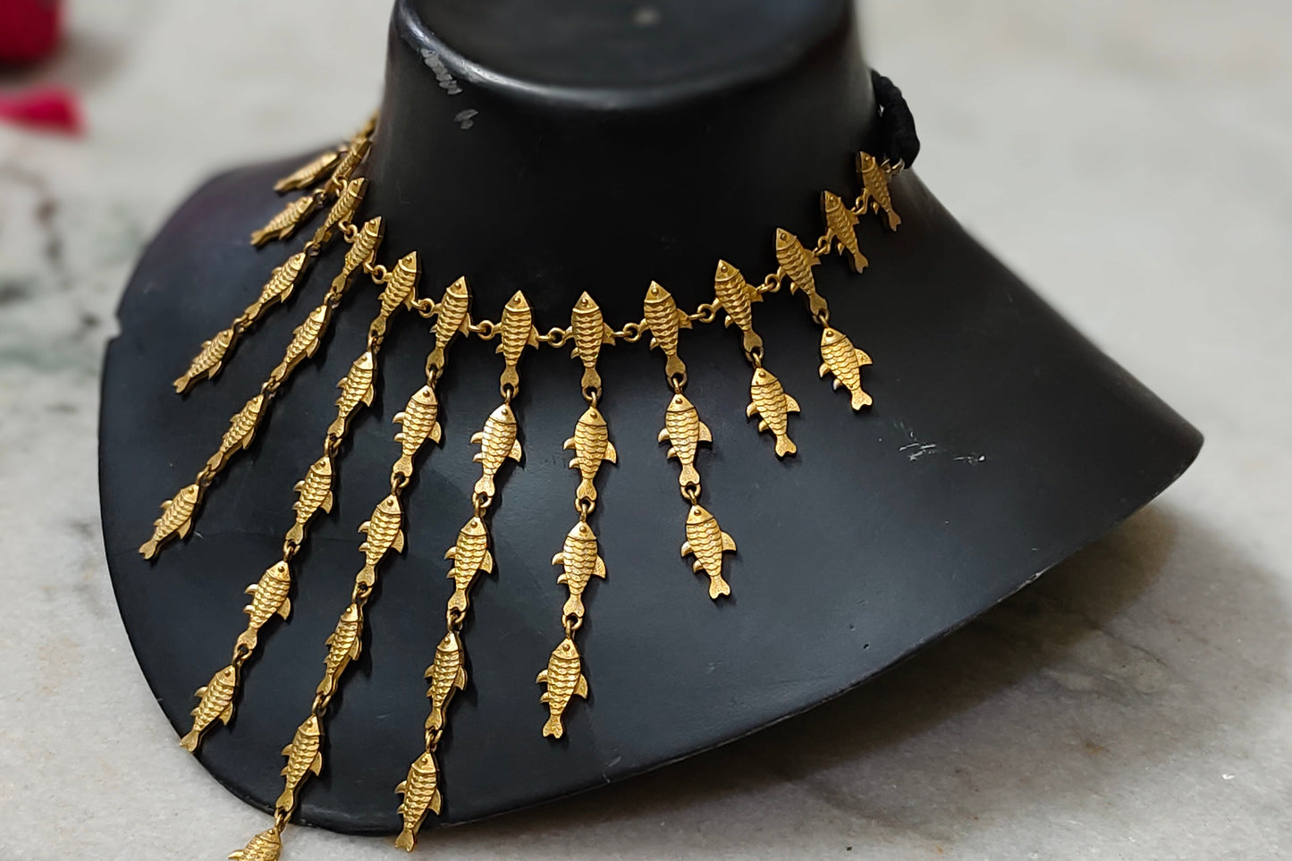 Fish neckpiece